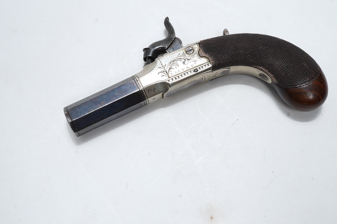 A pair of boxlock percussion pocket pistols with 4cm octagonal barrels, the frames engraved Lacy & Co., London, with London proof marks and rounded chequered walnut butts (2)